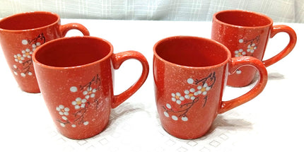 Tazón 500 cl reforzado con mango con motivo floral en colores anaranjados verdes celeste negros