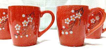 Tazón 500 cl reforzado con mango con motivo floral en colores anaranjados verdes celeste negros