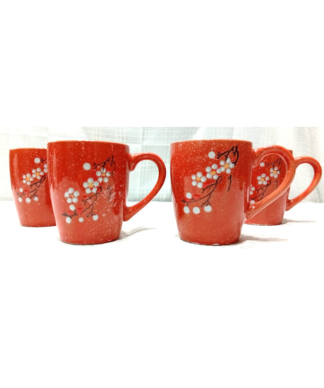 Tazón 500 cl reforzado con mango con motivo floral en colores anaranjados verdes celeste negros