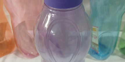 Botella de plástico de 1L con pico dosificador