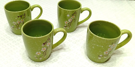 Tazón 500 cl reforzado con mango con motivo floral en colores anaranjados verdes celeste negros